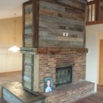 Rustic wood and brick fireplace Remodeling